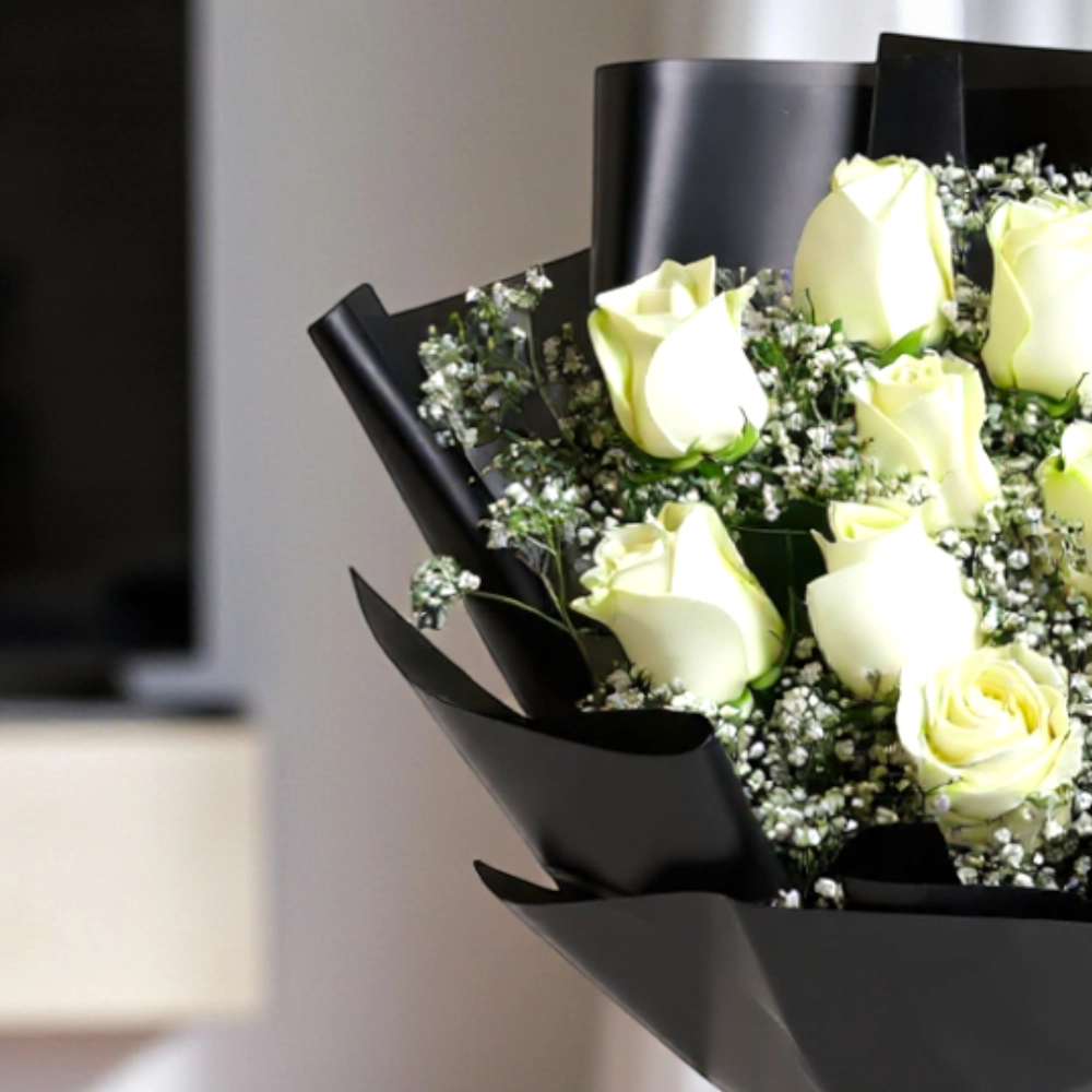 A bouquet of 12 white roses with nice wrapping