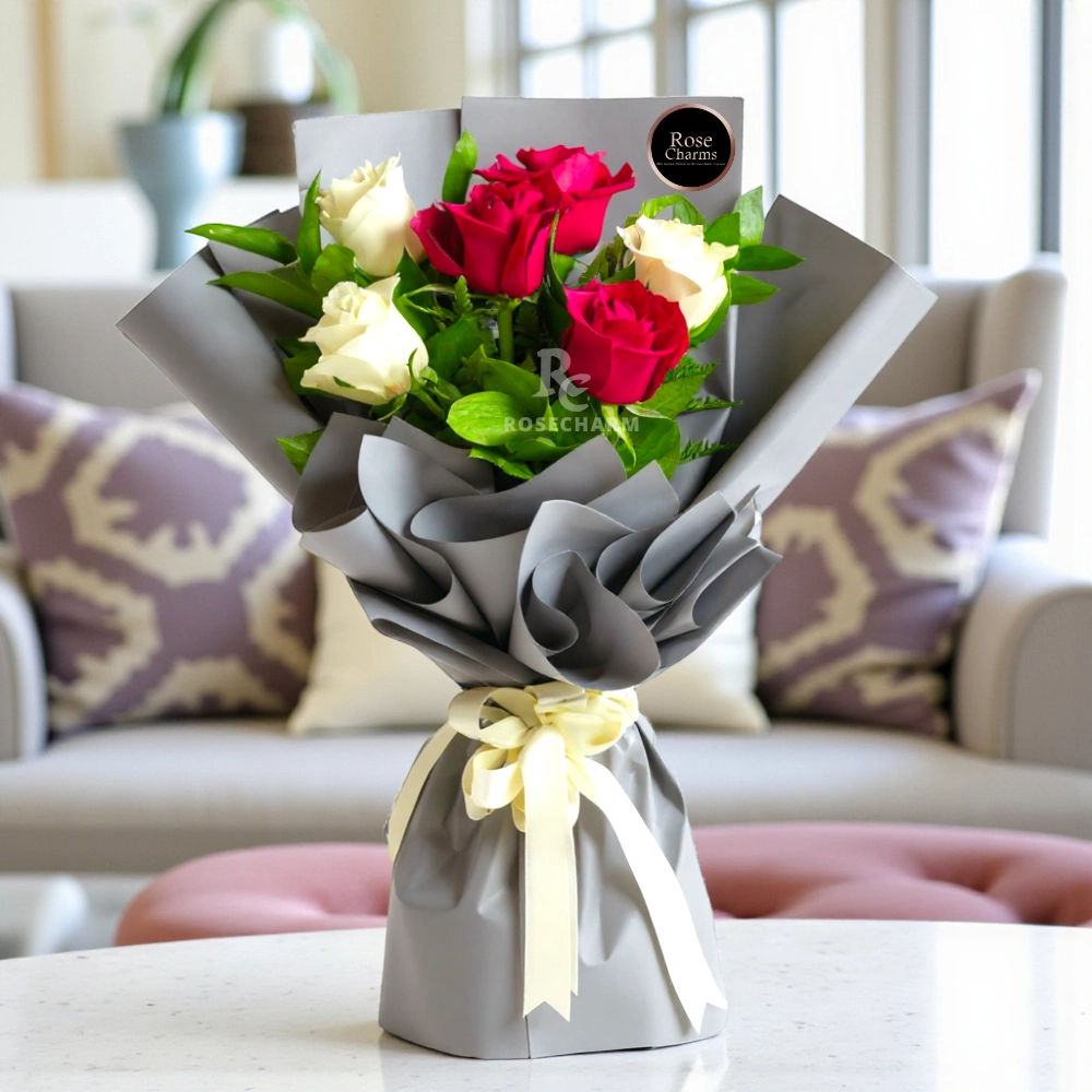 A bouquet of 6 red and white roses in a nice wrapping