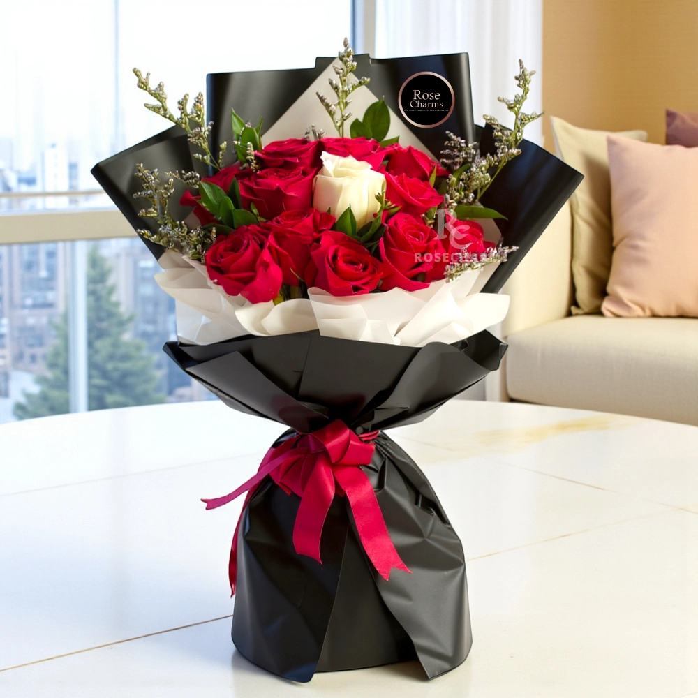 Bouquet of 12 red roses and 1 white rose in a nice wrapping