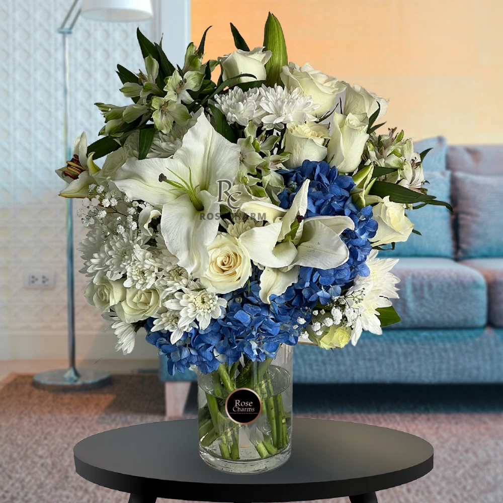 white and blue flowers arrangement