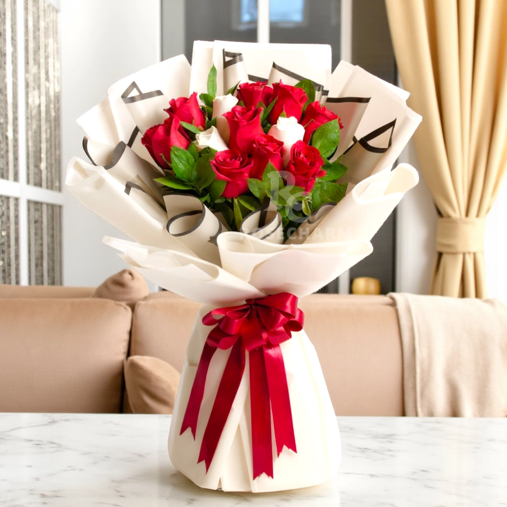 A bouquet of 9 red roses and 3 white roses