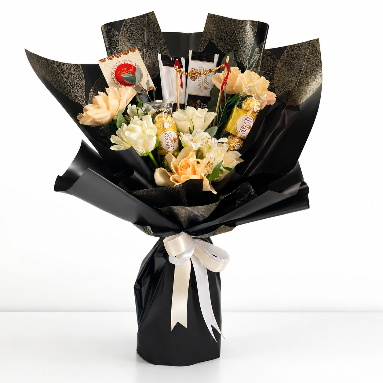 chocolates and designer Rakhi in black wrapping