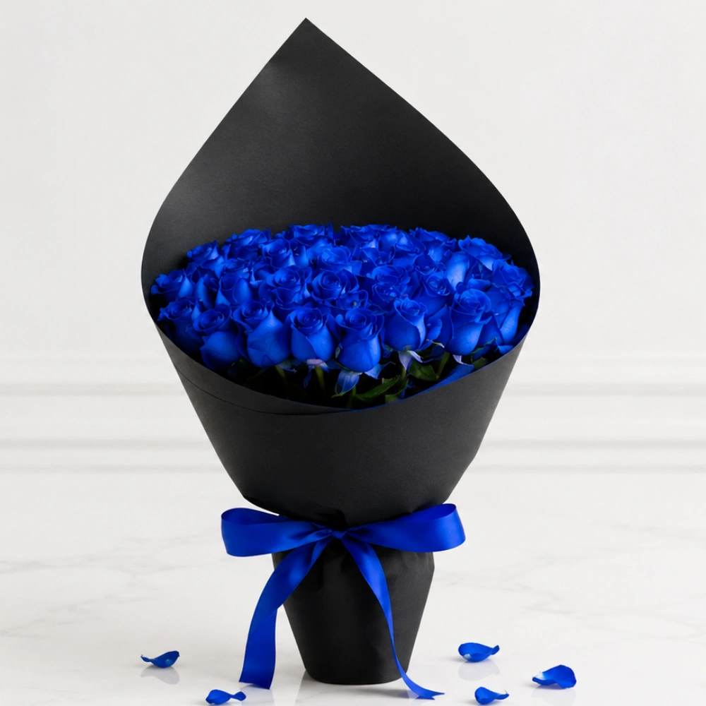 31 dark blue roses bouquet wrapped in premium black paper with fresh green fillers for luxury gifting