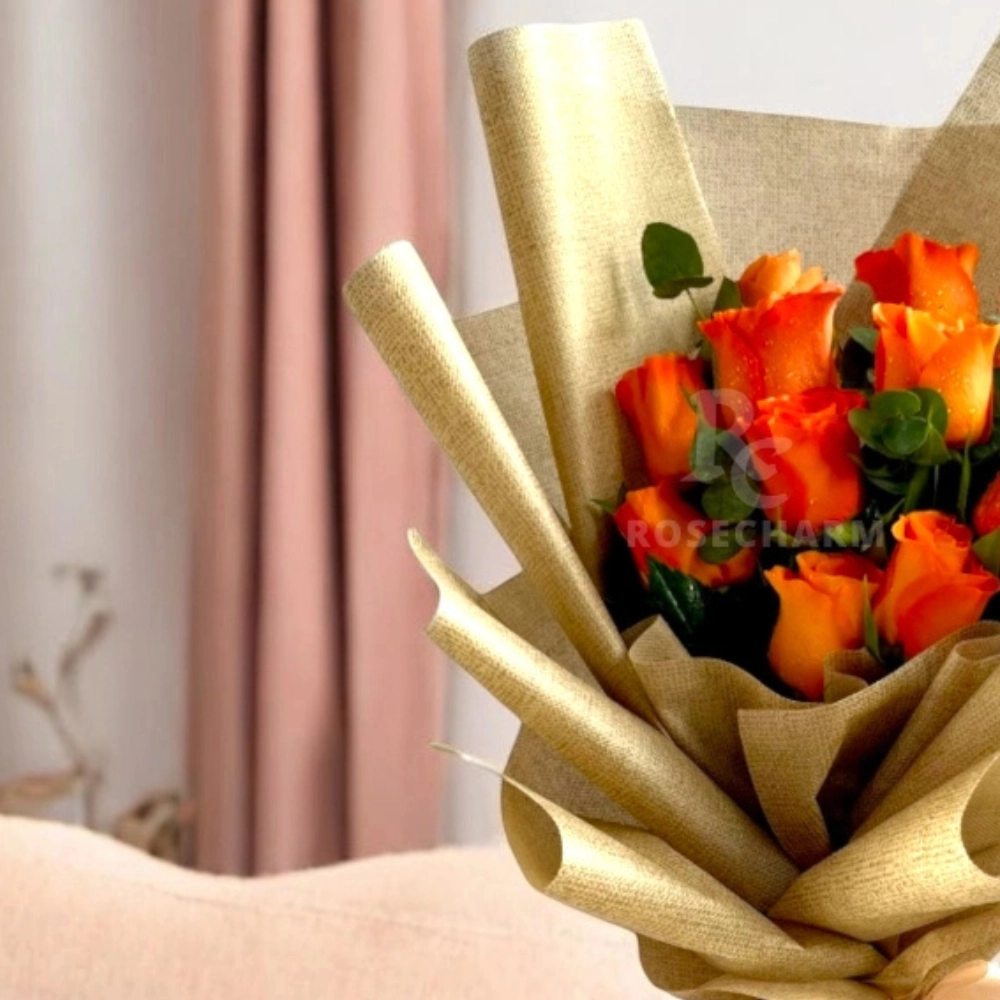 orange roses and chocolates bouquet