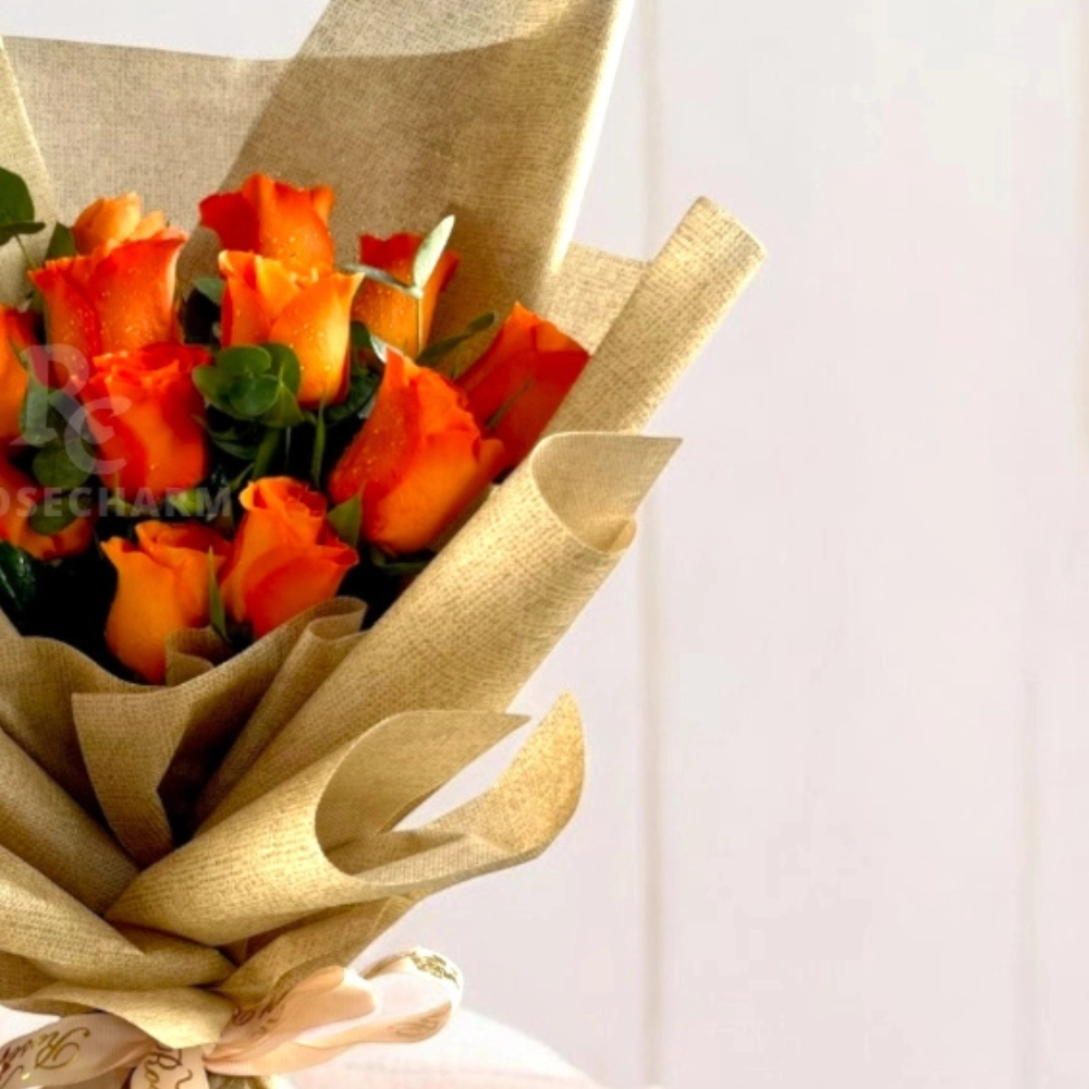 orange roses and chocolates bouquet