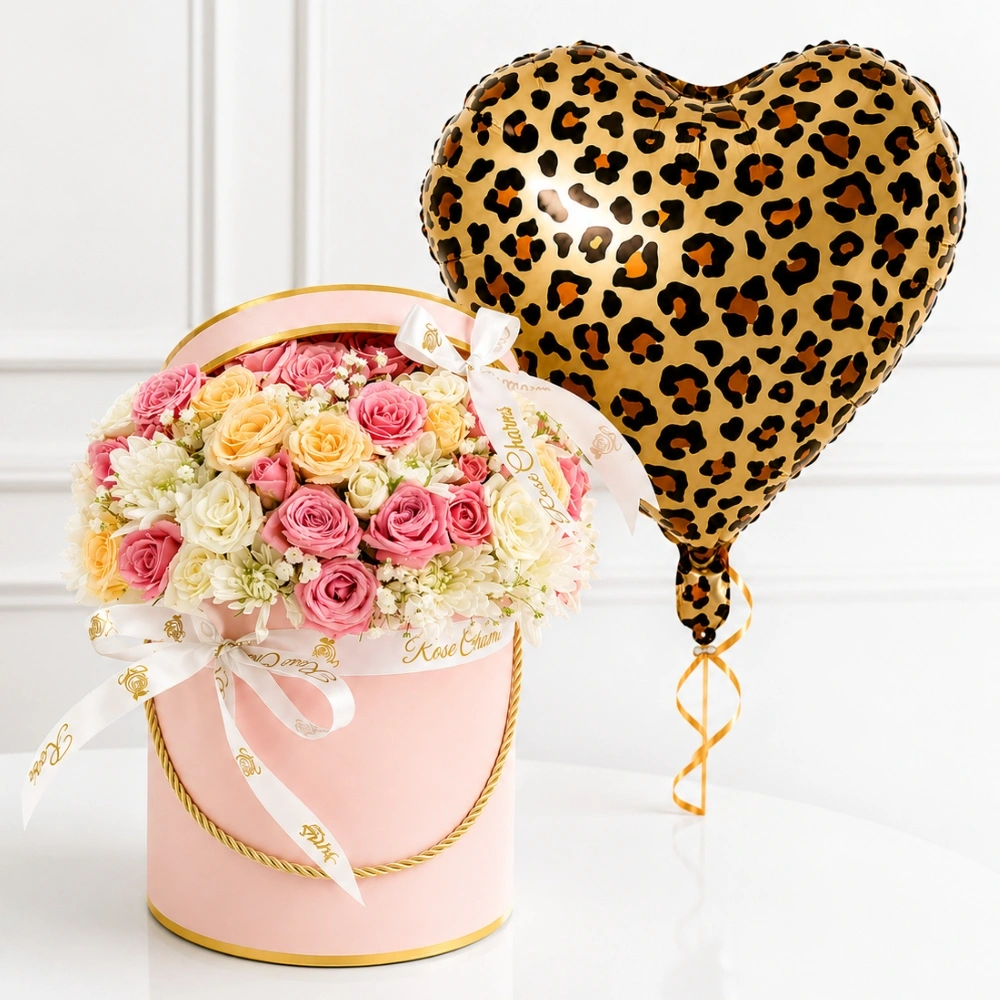 Pink Flower Box with Cheetah Balloon featuring pink spray roses, peach roses, white chrysanthemums and themed foil balloon