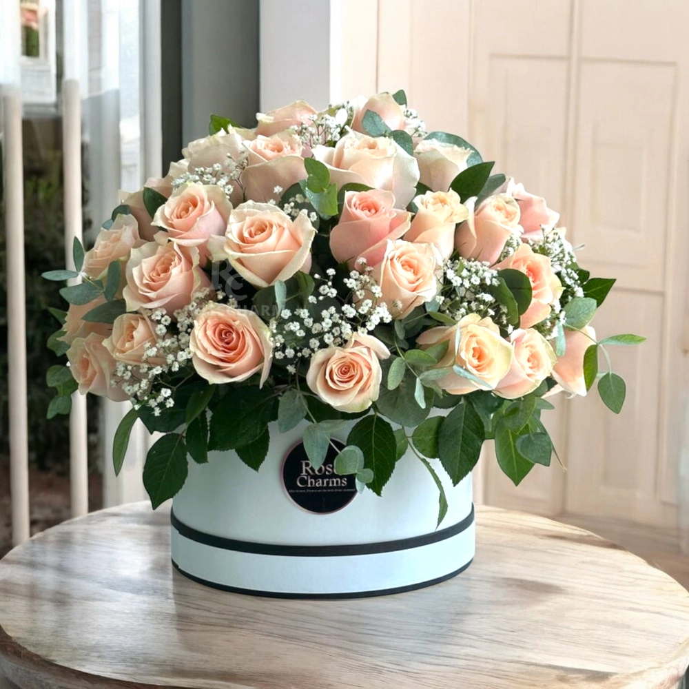 Pink roses box arrangement