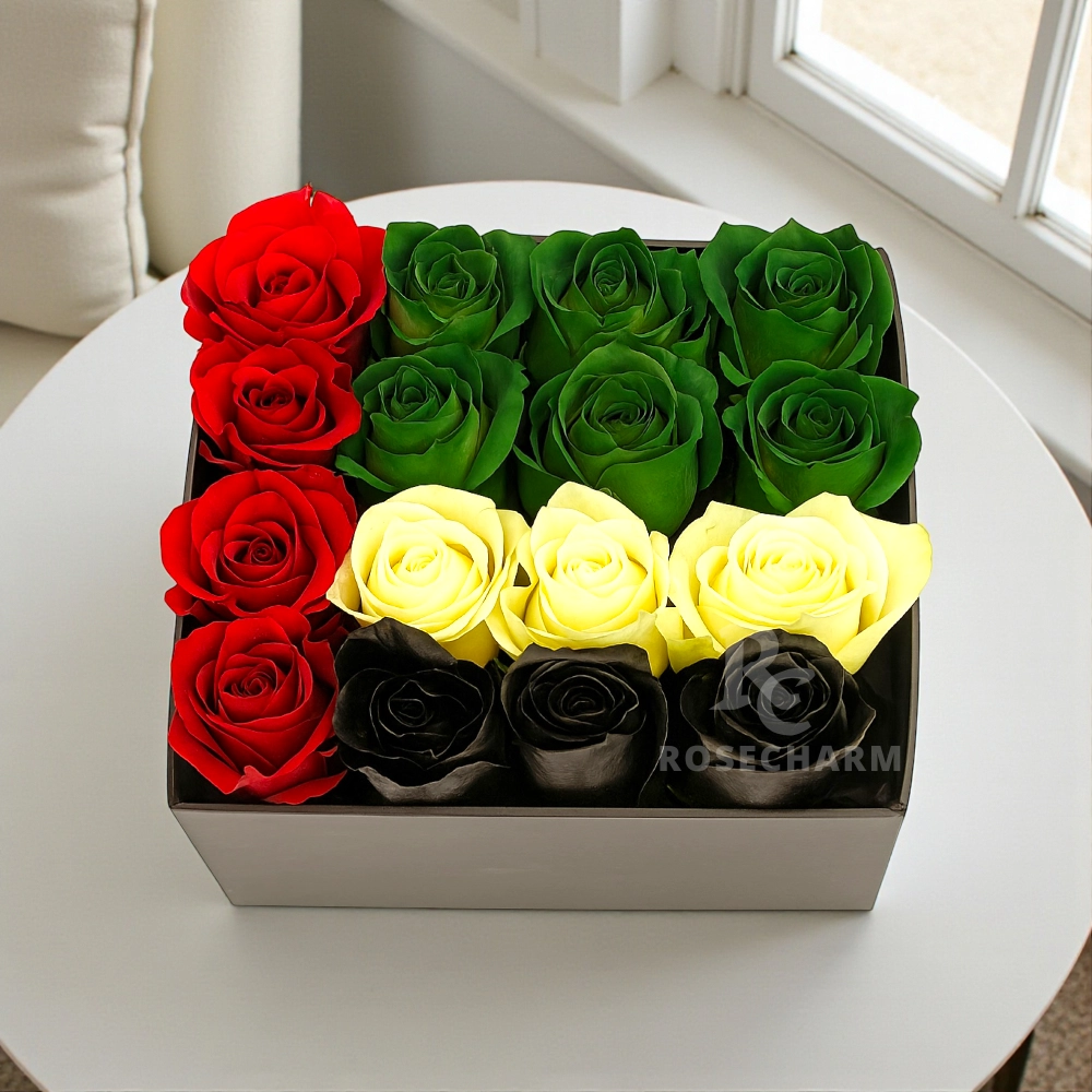 Arrangement of 16Pcs UAE flag color roses in a black box